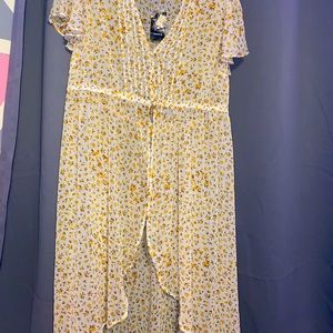 A cute flowery seethrough coverup from torrid size:00 but it fits like a large.